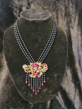 Heidi Daus Black Beaded Statement Necklace with Pink Crystal Floral Pendant